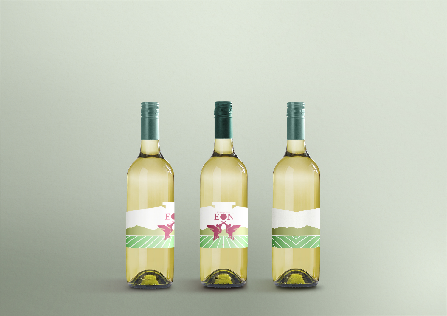3 wine bottles displaying a wraparound lable that has an illustration of two hummingbirds crossing beaks
